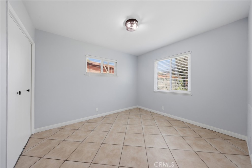 5653 Corwin Lane Riverside, CA 92503 - Photo 11 of 14 an empty room with windows