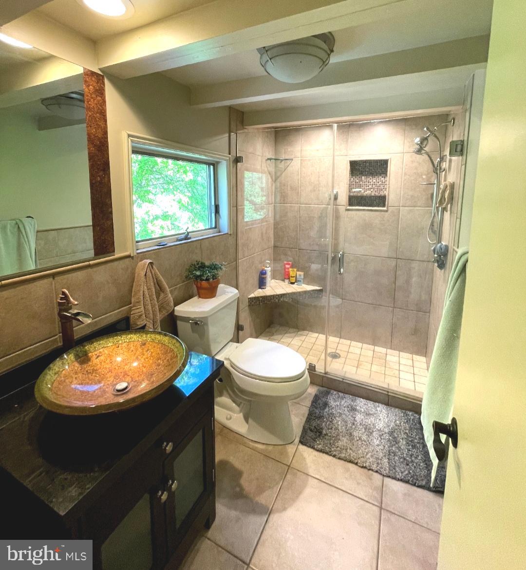 1451 Walton Road, Unit B Blue Bell, PA 19422 - Photo 10 of 12 a bathroom with a toilet a sink and a shower