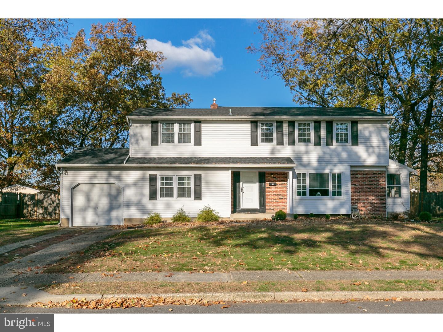 13 Ridgewood Avenue Delran, NJ 08075 - Photo 1 of 25 a front view of a house with a yard