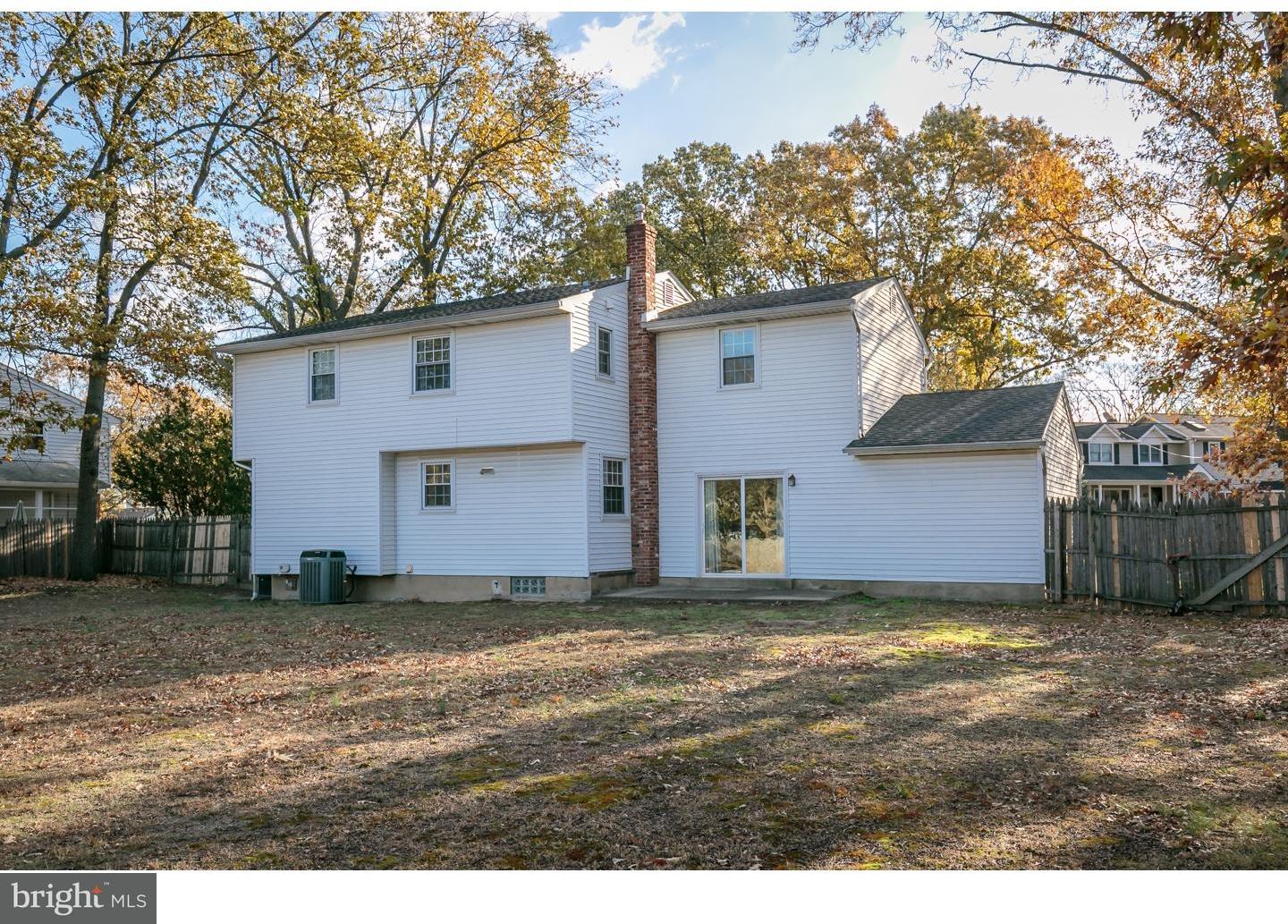 13 Ridgewood Avenue Delran, NJ 08075 - Photo 23 of 25 a view of a yard with a tree