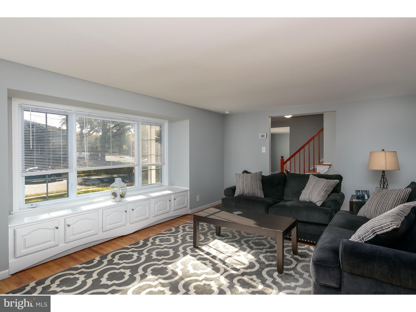 13 Ridgewood Avenue Delran, NJ 08075 - Photo 6 of 25 a living room with furniture and a large window