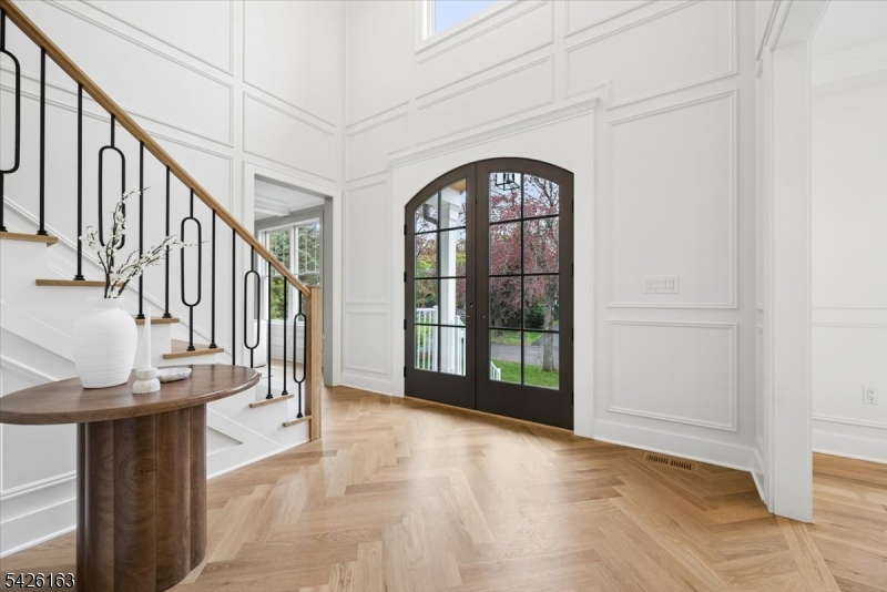 34 Crestview Avenue Madison, NJ 07940 - Photo 15 of 43 a view of entryway and hall with wooden floor