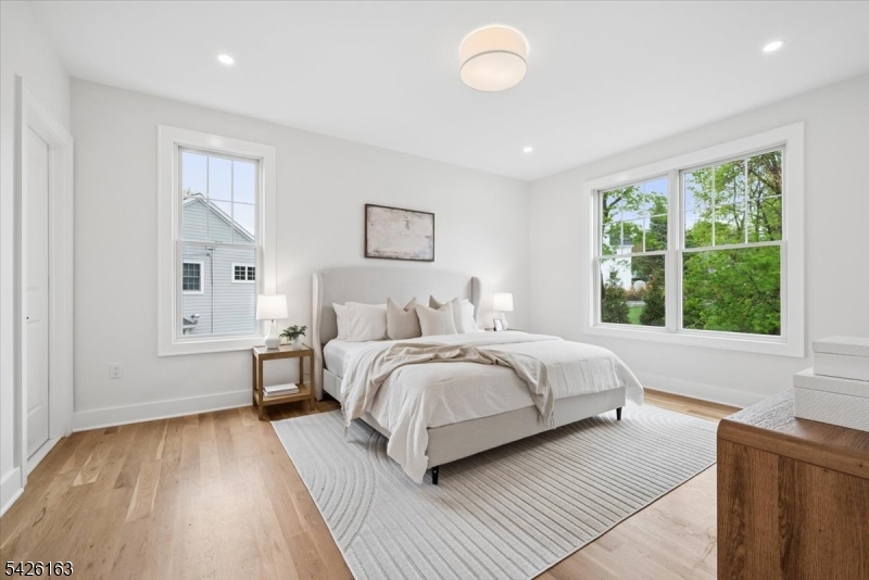 34 Crestview Avenue Madison, NJ 07940 - Photo 19 of 43 a bedroom with a bed and a large window