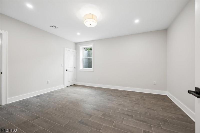 34 Crestview Avenue Madison, NJ 07940 - Photo 35 of 43 an empty room with a empty space and window