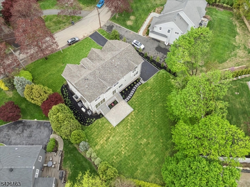 34 Crestview Avenue Madison, NJ 07940 - Photo 42 of 43 an aerial view of a house with a garden