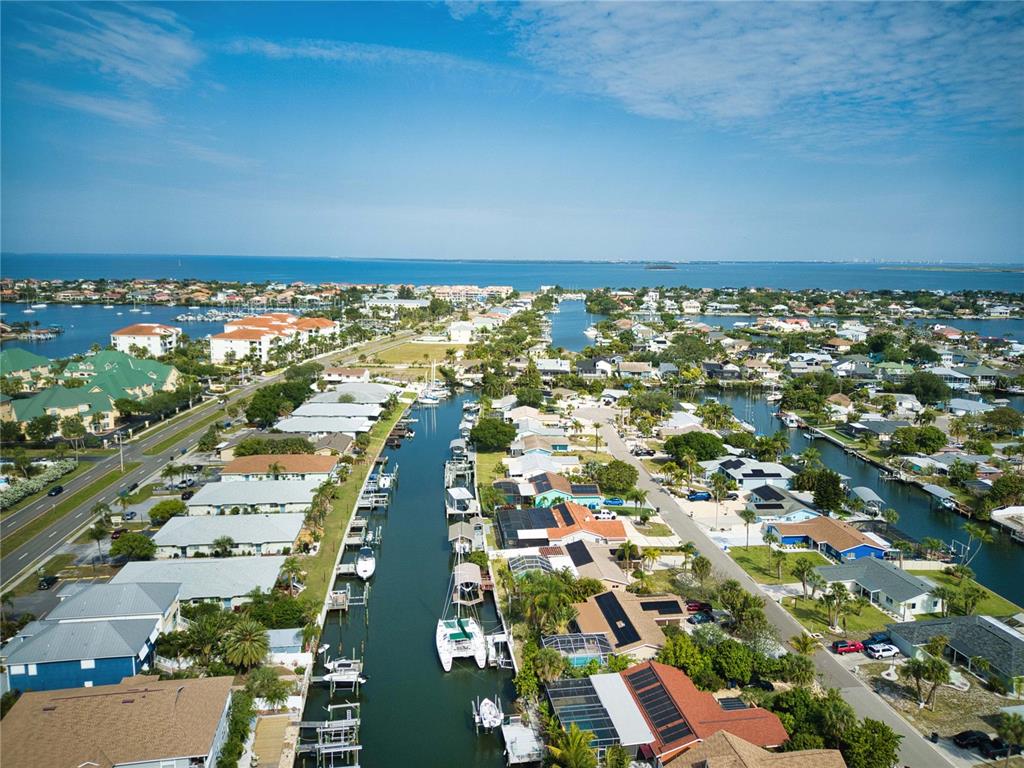 6504 Abaco Drive, Unit 101 Apollo Beach, FL 33572 - Photo 29 of 34 an aerial view of residential building and ocean