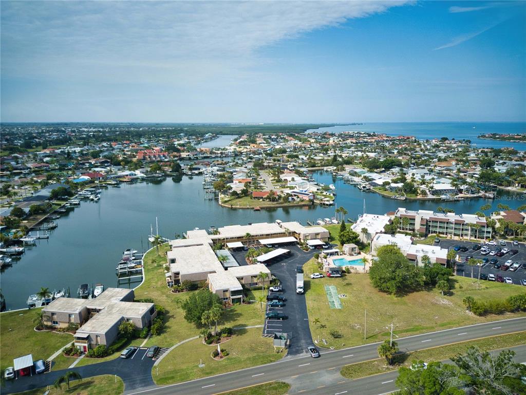 6504 Abaco Drive, Unit 101 Apollo Beach, FL 33572 - Photo 32 of 34 an aerial view of a houses with outdoor space