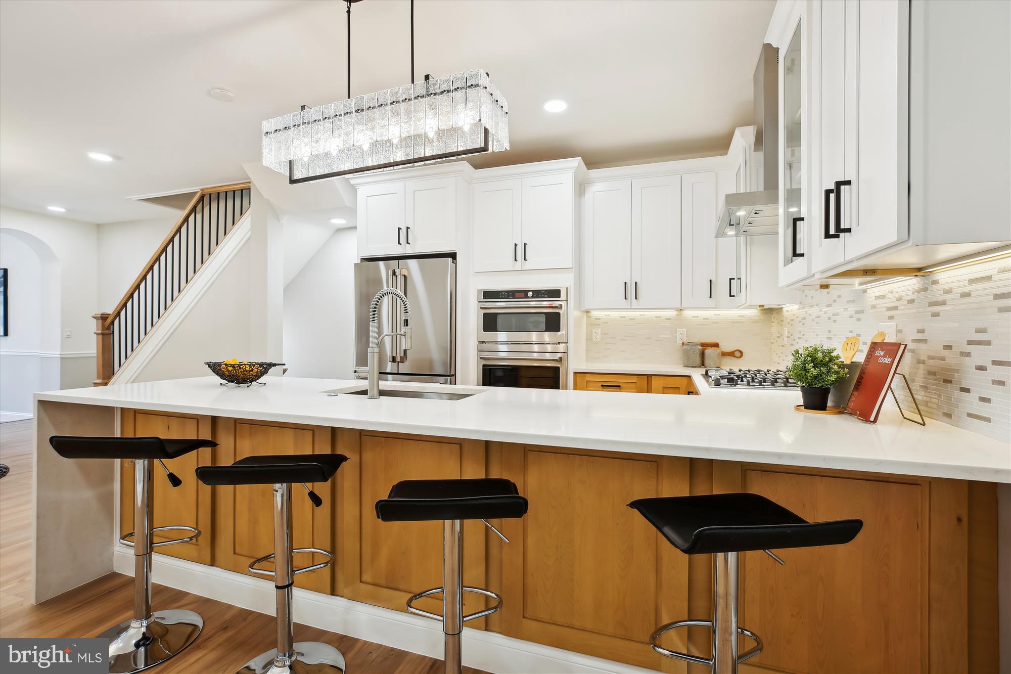 329 15th Street Northeast Washington, DC 20002 - Photo 12 of 71 a kitchen with a table chairs sink and cabinets