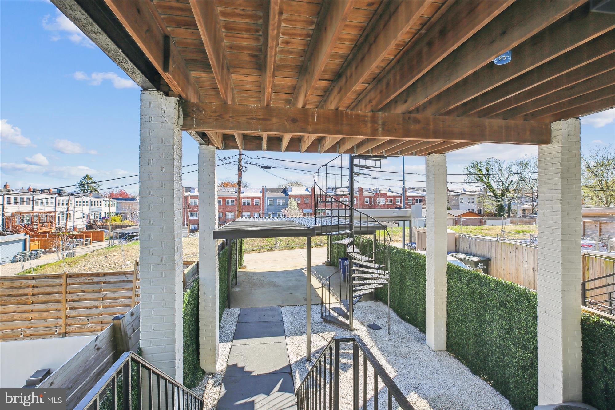 329 15th Street Northeast Washington, DC 20002 - Photo 19 of 71 a balcony with chairs and table in the balcony