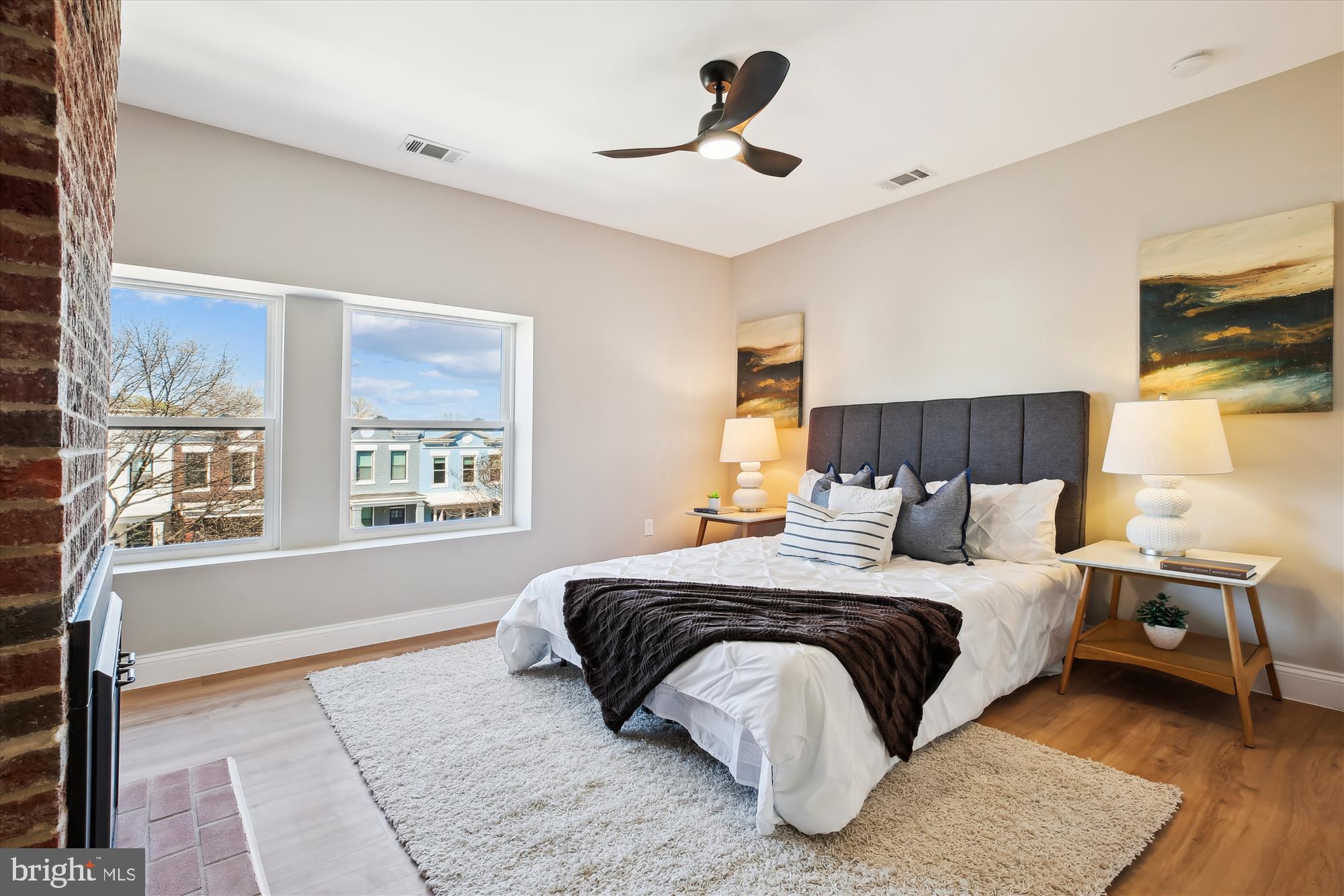 329 15th Street Northeast Washington, DC 20002 - Photo 23 of 71 a bedroom with a large bed and a window