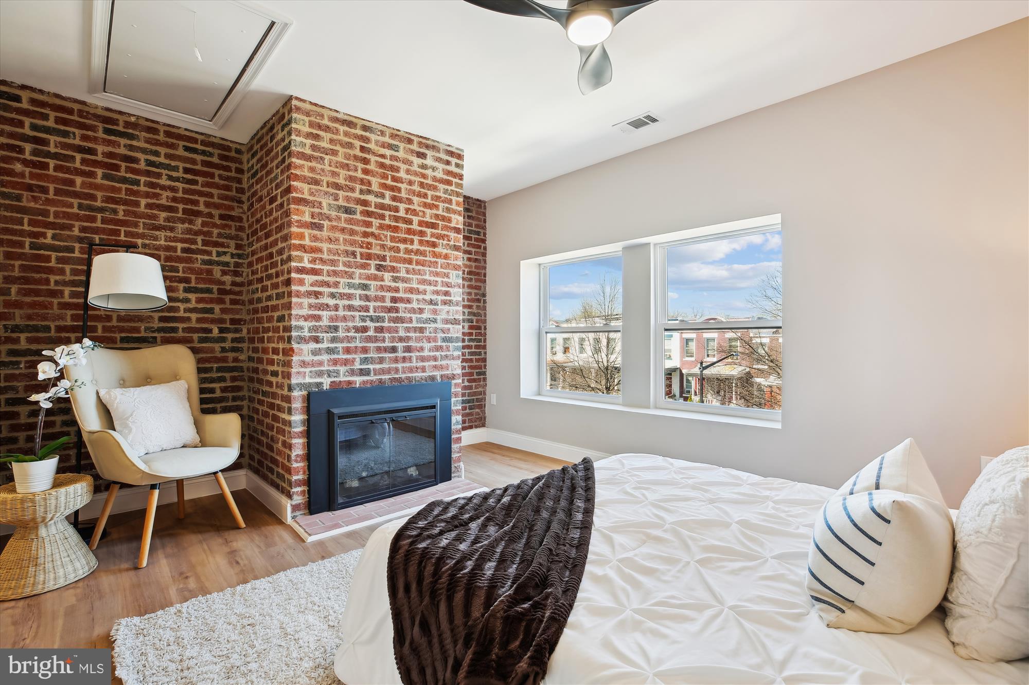 329 15th Street Northeast Washington, DC 20002 - Photo 24 of 71 a bedroom with a bed and a chair