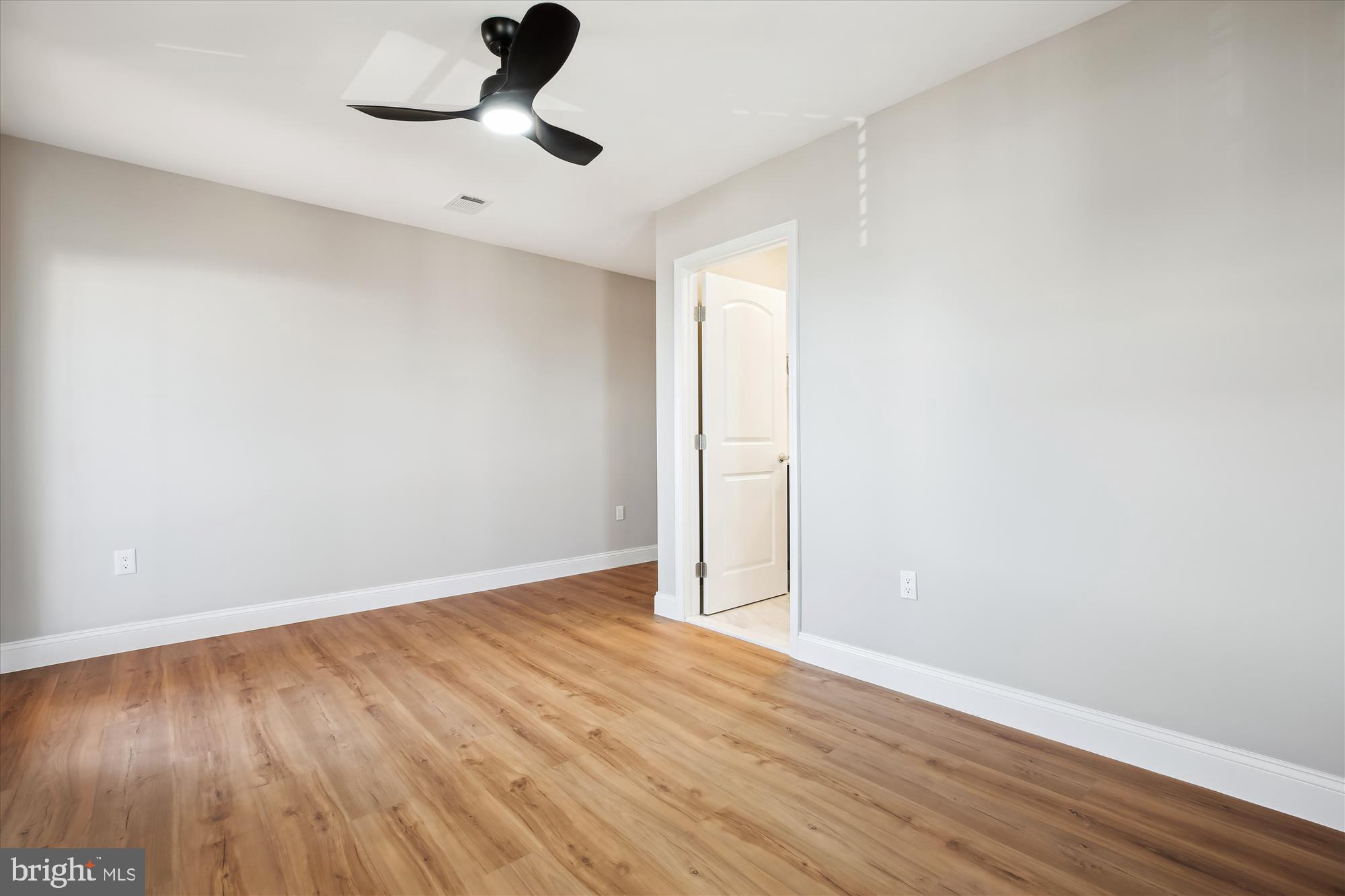 329 15th Street Northeast Washington, DC 20002 - Photo 33 of 71 a view of an empty room with wooden floor