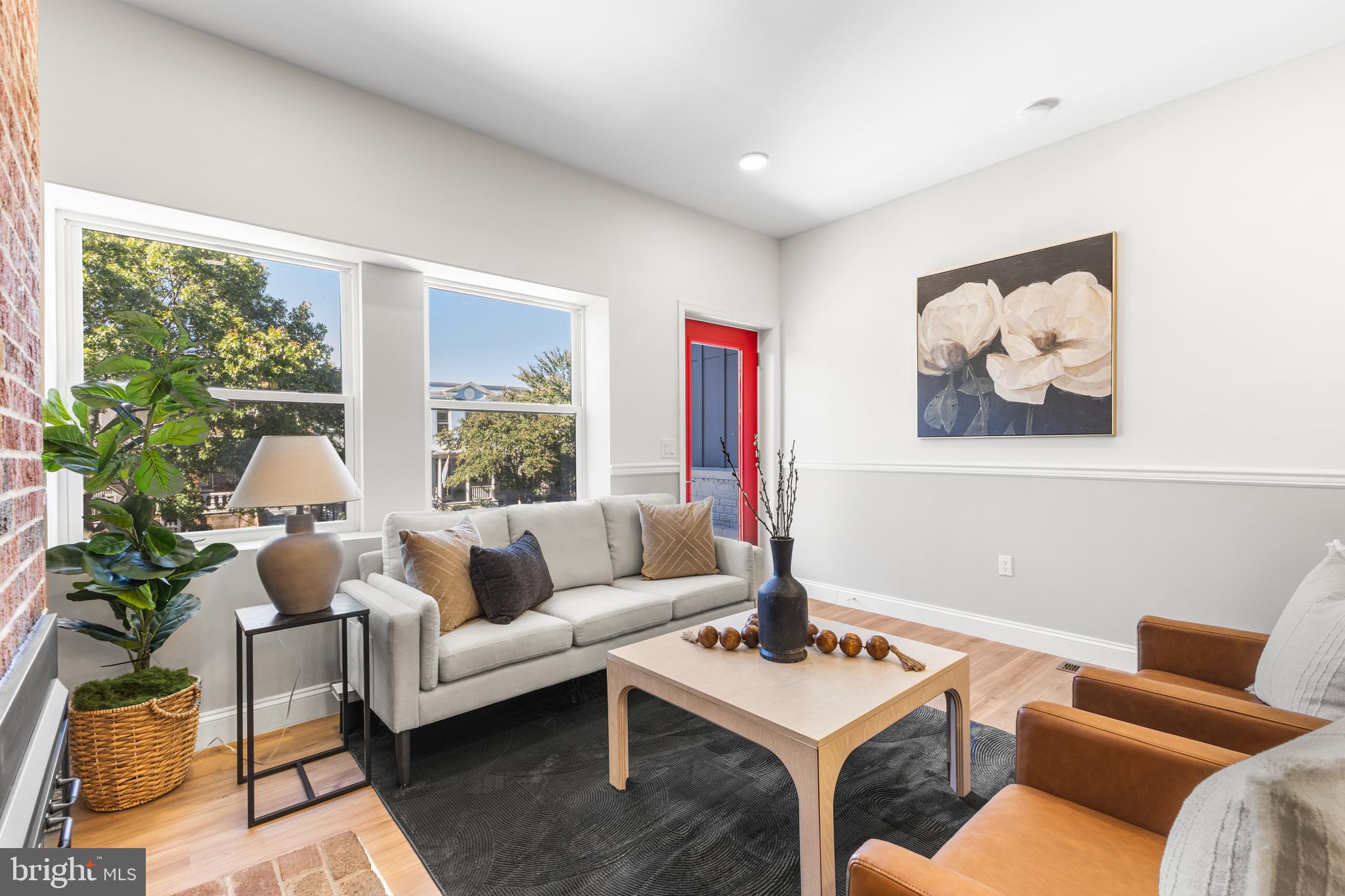 329 15th Street Northeast Washington, DC 20002 - Photo 4 of 71 a living room with furniture and a large window
