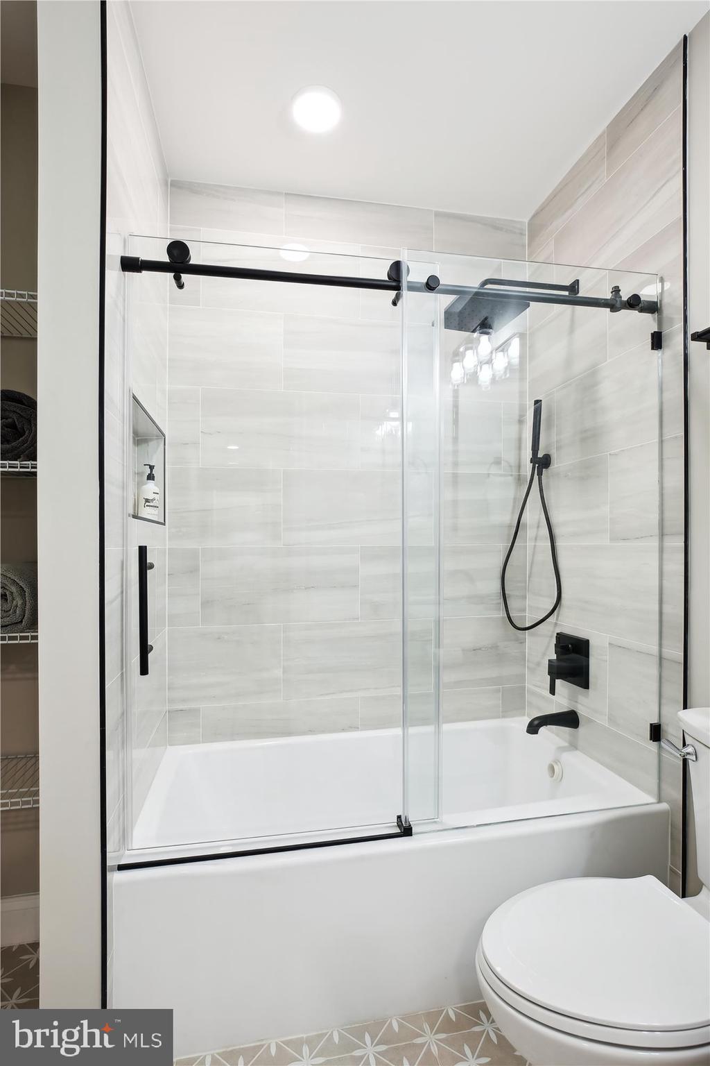 329 15th Street Northeast Washington, DC 20002 - Photo 43 of 71 a bathroom with a toilet and a shower