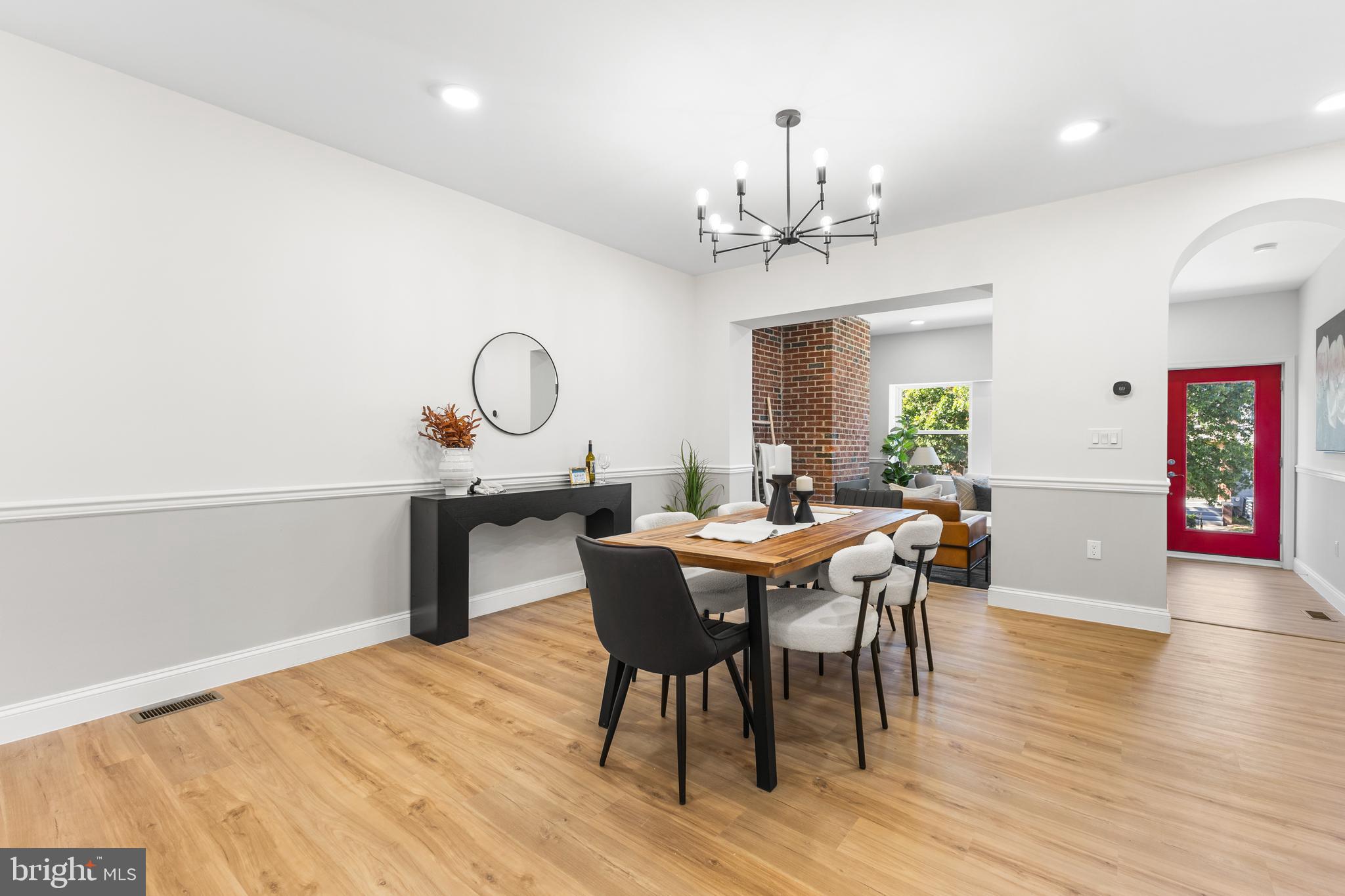329 15th Street Northeast Washington, DC 20002 - Photo 5 of 71 a view of a dining room with furniture and wooden floor