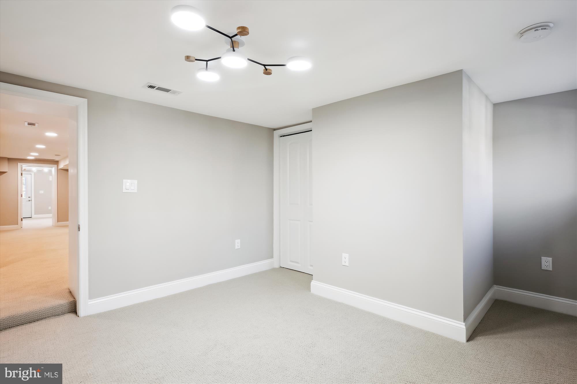 329 15th Street Northeast Washington, DC 20002 - Photo 56 of 71 an empty room with a ceiling fan and a window