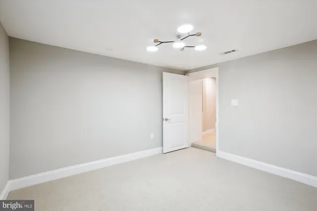 a view of staircase with a rug