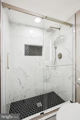 a view of swimming pool with a patio