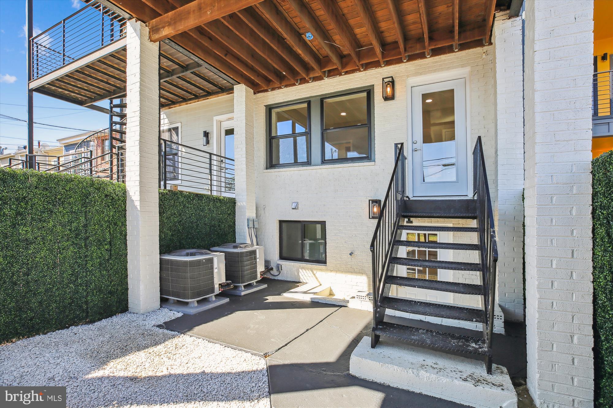 329 15th Street Northeast Washington, DC 20002 - Photo 61 of 71 a view of a porch with furniture and floor to ceiling window