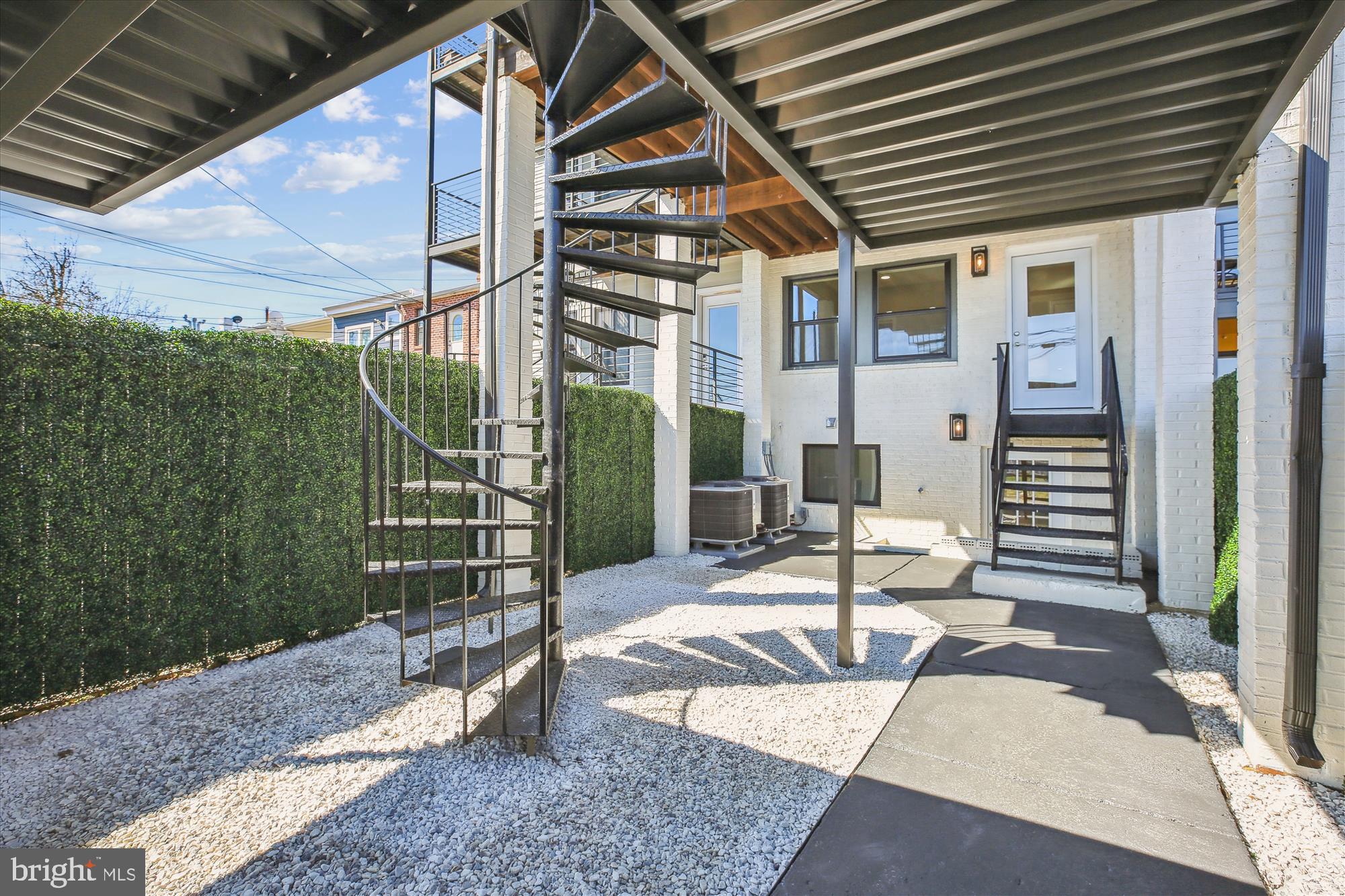 329 15th Street Northeast Washington, DC 20002 - Photo 63 of 71 a view of a patio with table and chairs with wooden floor and fence