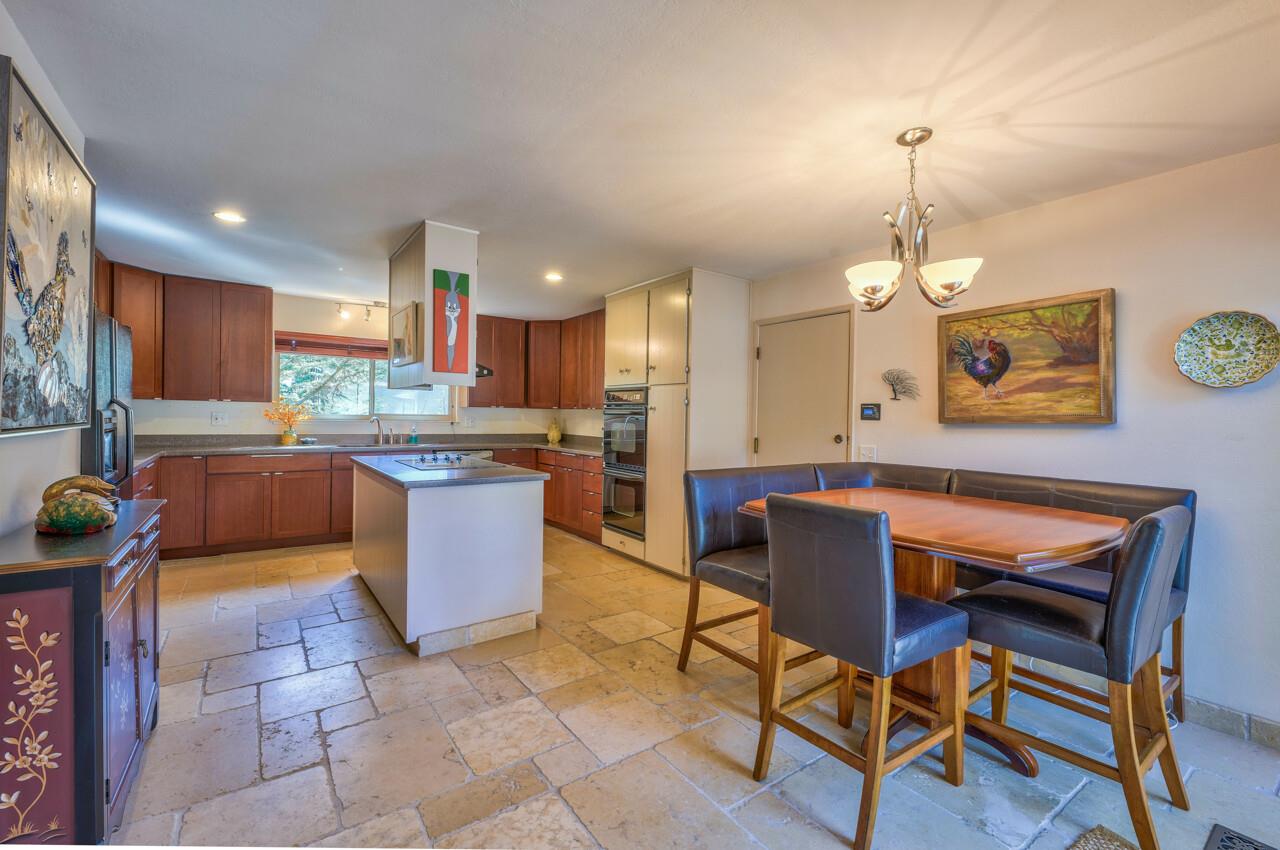 4193 Crest Road Pebble Beach, CA 93953 - Photo 4 of 20 a kitchen with a sink a counter top space and appliances