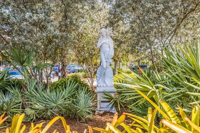 a patio with a patio table and chairs