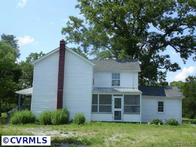 1586 Plank Road Farmville, VA 23901 - Photo 6 of 10 a view of a house with a yard potted plants and large tree