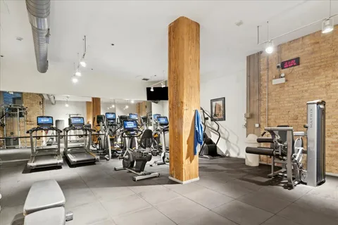 a view of an empty room with windows