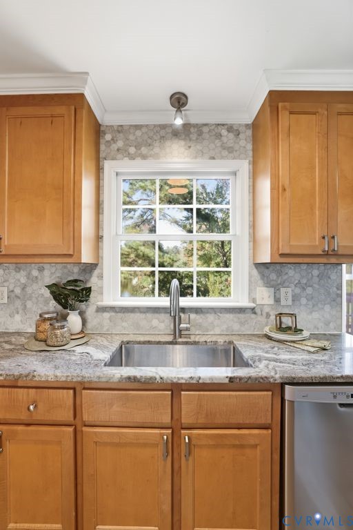 12004 Stamford Road Midlothian, VA 23112 - Photo 15 of 49 a kitchen with granite countertop a sink window and cabinets