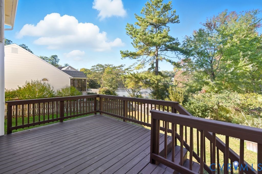 12004 Stamford Road Midlothian, VA 23112 - Photo 37 of 49 a view of balcony with wooden floor and fence