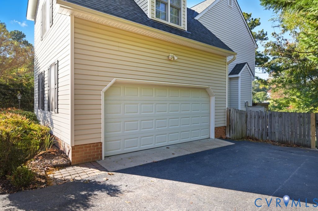 12004 Stamford Road Midlothian, VA 23112 - Photo 43 of 49 a view of a house with a garage