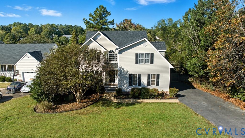 12004 Stamford Road Midlothian, VA 23112 - Photo 44 of 49 a view of a house with backyard and garden