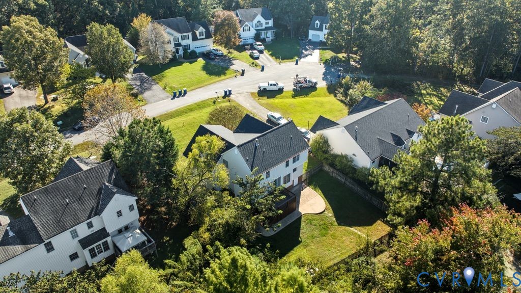 12004 Stamford Road Midlothian, VA 23112 - Photo 46 of 49 an aerial view of a house with a swimming pool