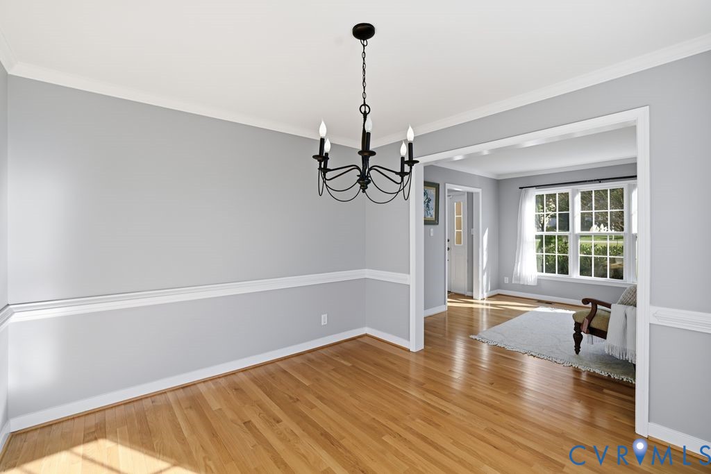 12004 Stamford Road Midlothian, VA 23112 - Photo 9 of 49 a view of a room with wooden floor fan and windows