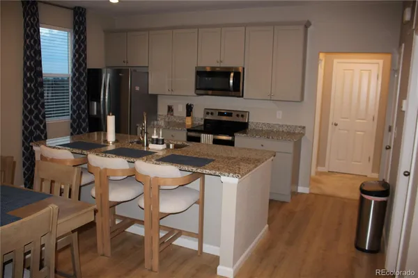 a bedroom with bed and a closet