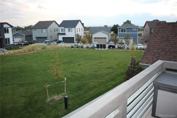 a front view of a house with a garage