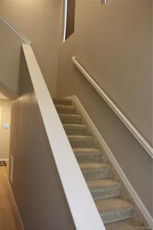 a kitchen with sink and window
