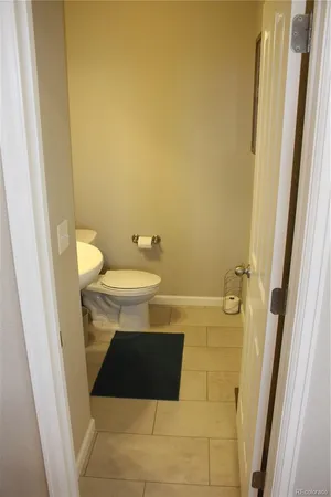 a living room with furniture and a gate