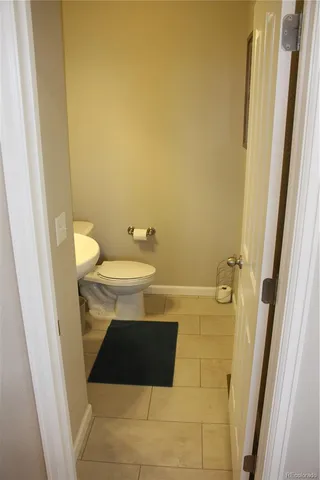 a living room with furniture and a gate