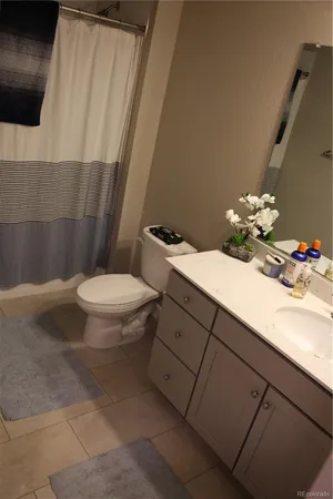 a view of hallway with wooden floor