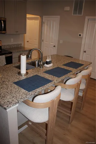 a table and chairs in a kitchen