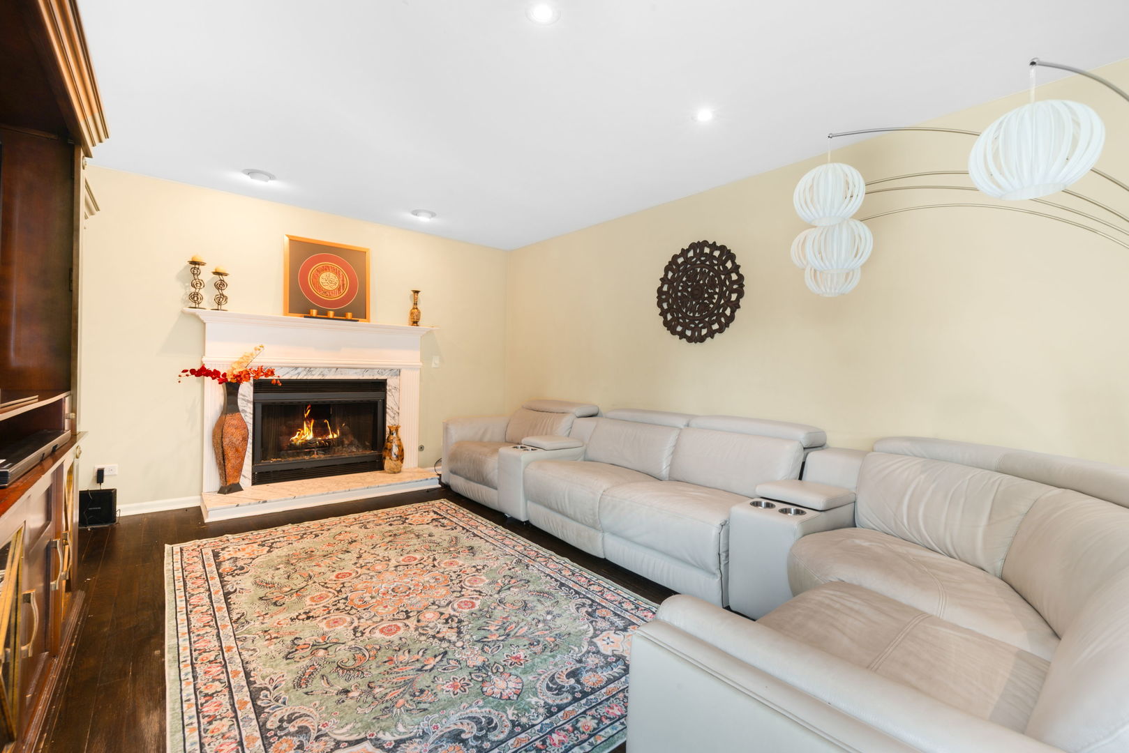 754 Huntington Drive Carol Stream, IL 60188 - Photo 11 of 29 a living room with furniture and a fireplace