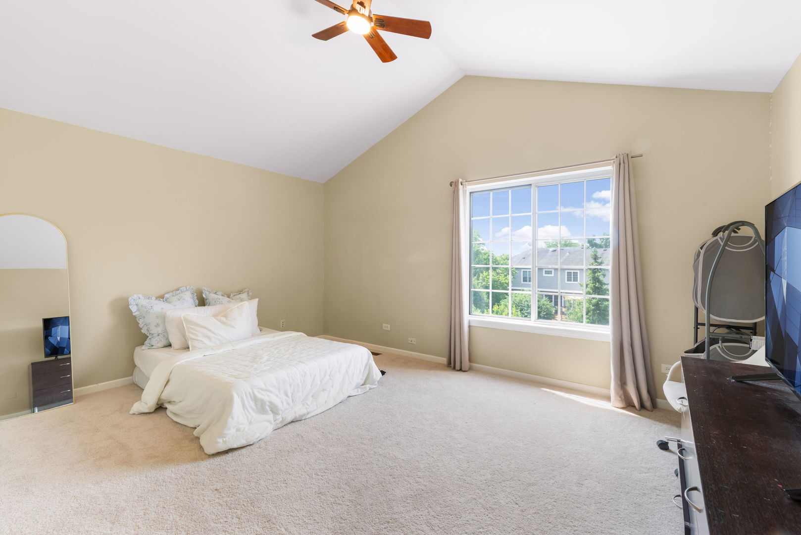 754 Huntington Drive Carol Stream, IL 60188 - Photo 15 of 29 a bed room with a bed tv and a window