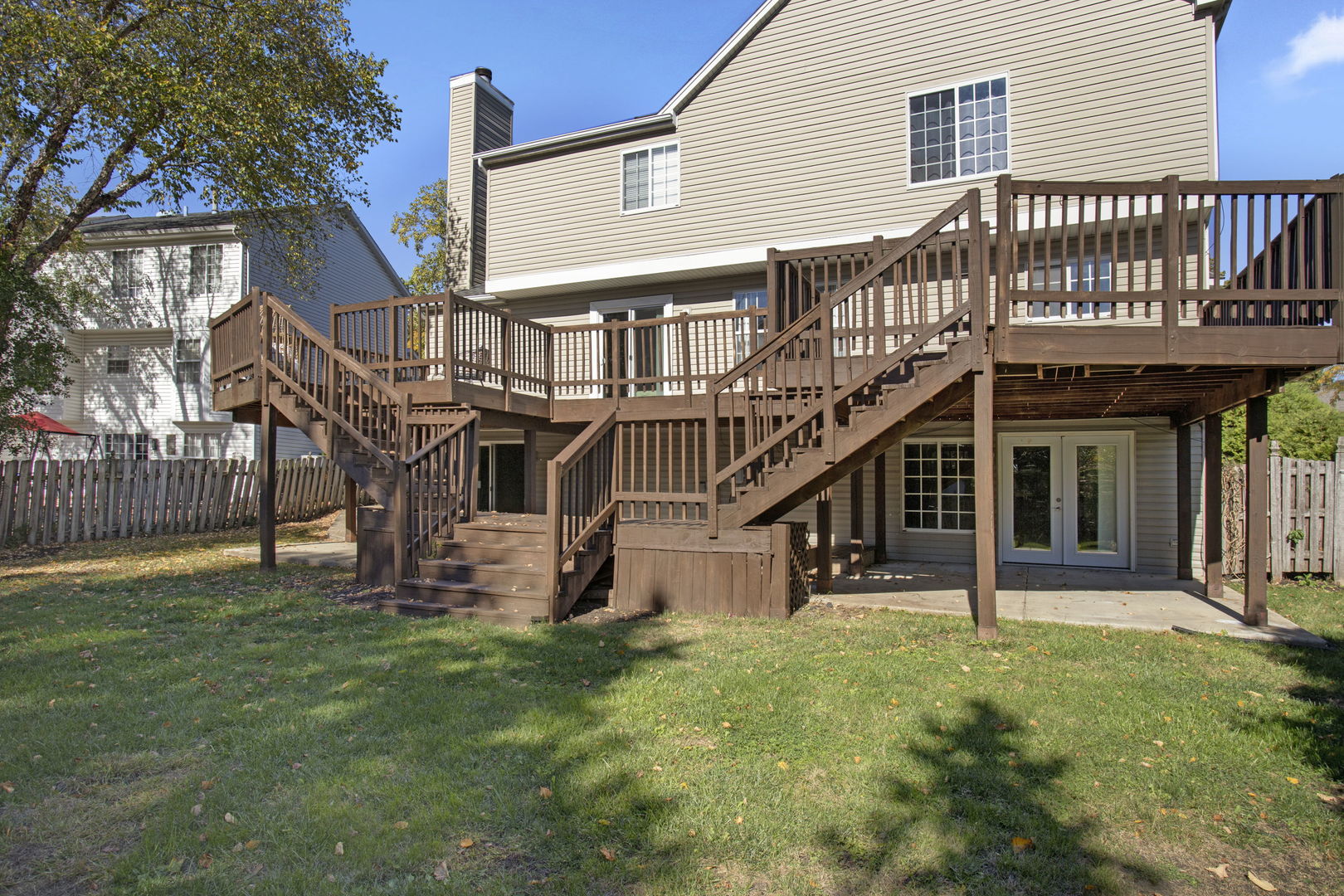 754 Huntington Drive Carol Stream, IL 60188 - Photo 24 of 29 a view of a house with a yard and a deck