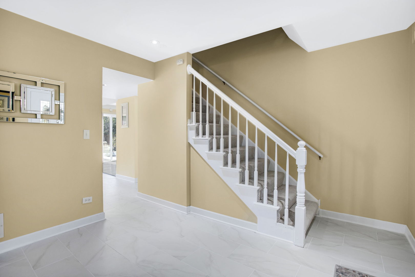 754 Huntington Drive Carol Stream, IL 60188 - Photo 3 of 29 a view of a hallway with staircase