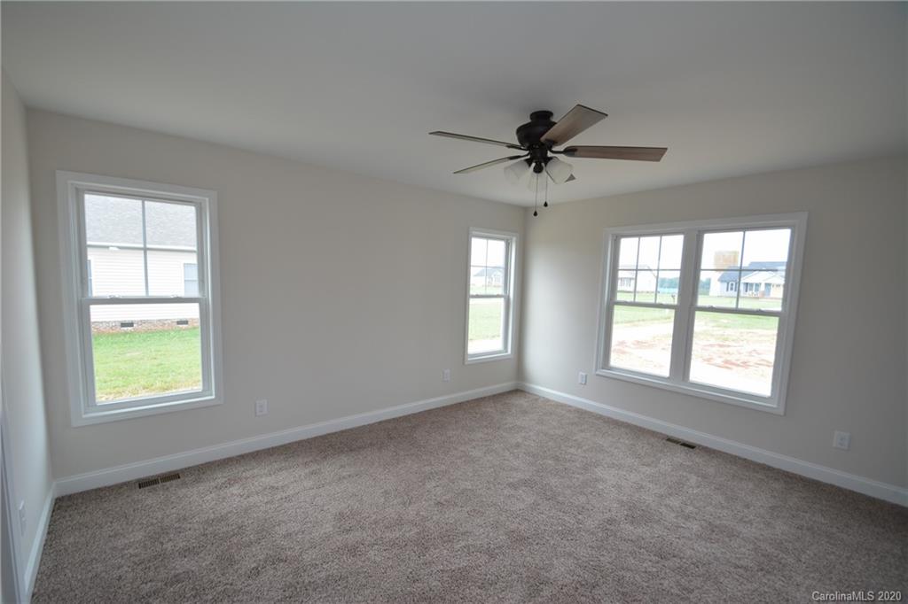 1311 George Brown Road Crouse, NC 28033 - Photo 16 of 32 a view of an empty room with a window