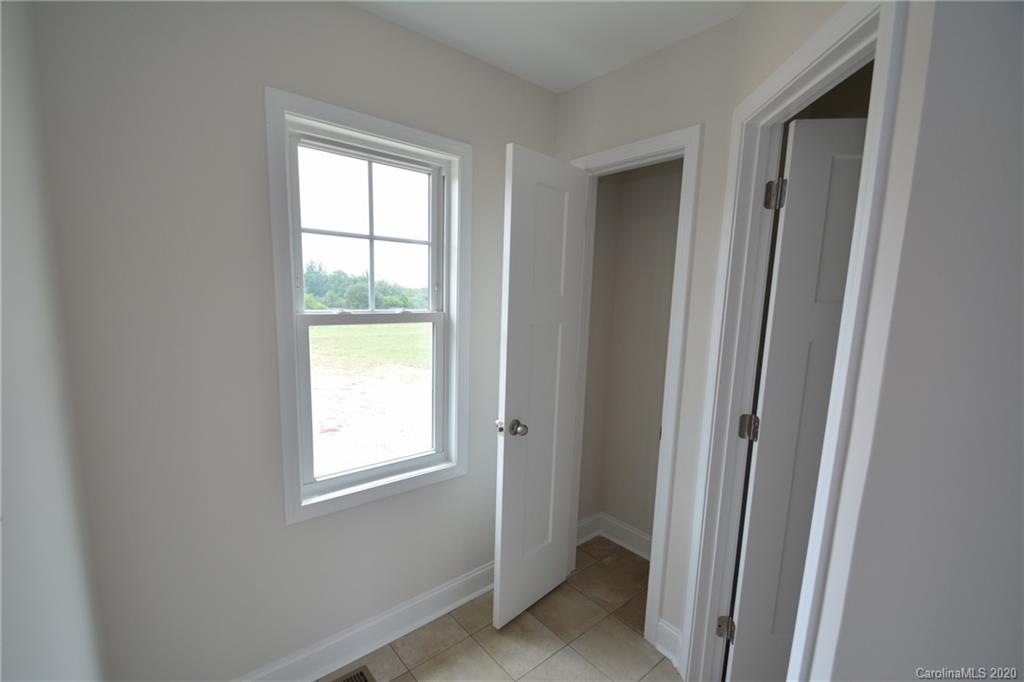 1311 George Brown Road Crouse, NC 28033 - Photo 22 of 32 a view of an empty room with a window