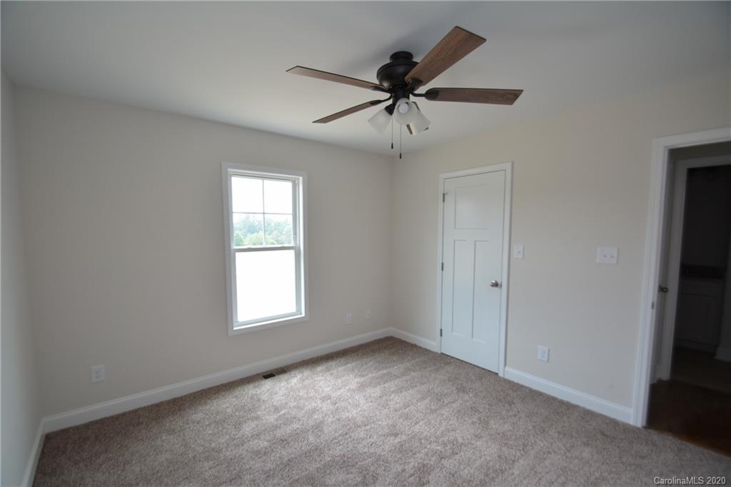 1311 George Brown Road Crouse, NC 28033 - Photo 30 of 32 a view of a livingroom with a ceiling fan & windows