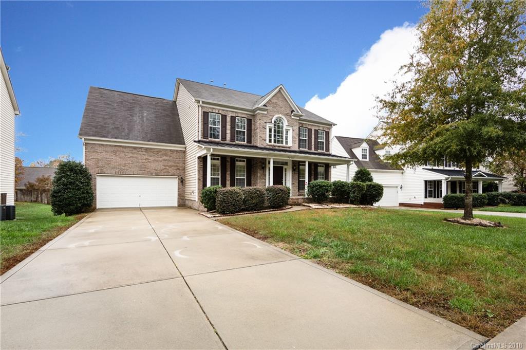 7810 Greylock Ridge Road Matthews, NC 28105 - Photo 2 of 31 a front view of a house with a yard