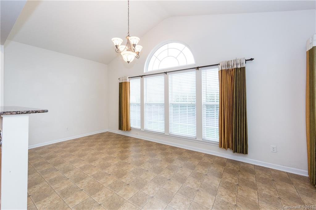 7810 Greylock Ridge Road Matthews, NC 28105 - Photo 16 of 31 a view of an empty room with a window
